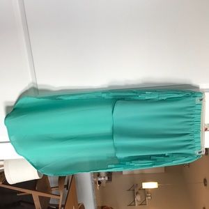 Adorable teal high-lo skirt w/ fringe detail